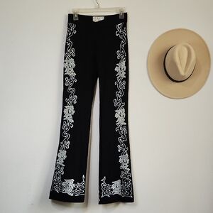 Elegant Black and Silver Flare Pants
